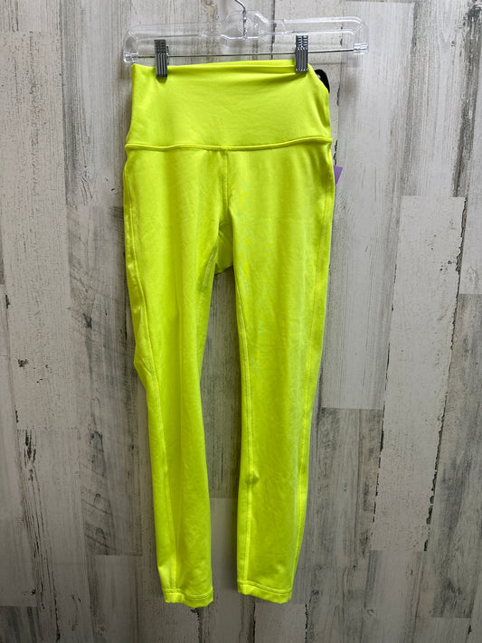 NEW Free People Self-Ecology legging in Neon Yellow. $140 XS